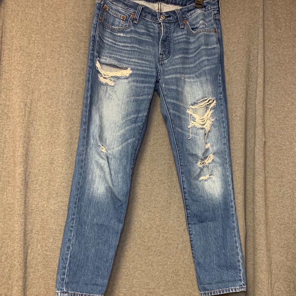 Distressed jeans.
